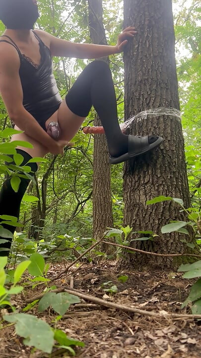 Sissy bitch had an extreme dildo fuck in the park and experienced a pygasm in a chastity belt