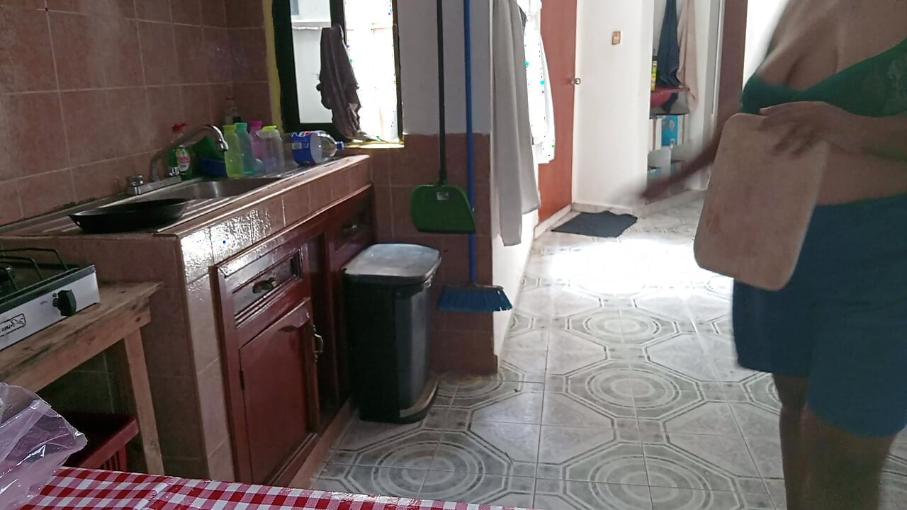 Mom in the kitchen in bralett
