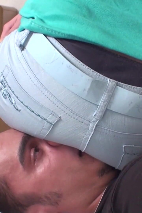 Watching TV sitting on slave's face