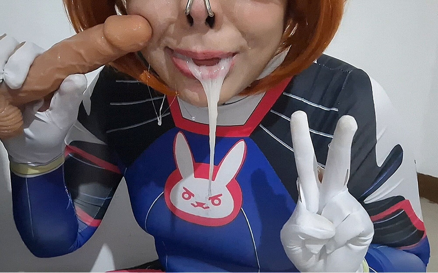 Full Version: Femboy with Dva Cosplay and BDSM Nosehook Giving a Blowjob, Eating Cum and Deepthroat to Big Dildo