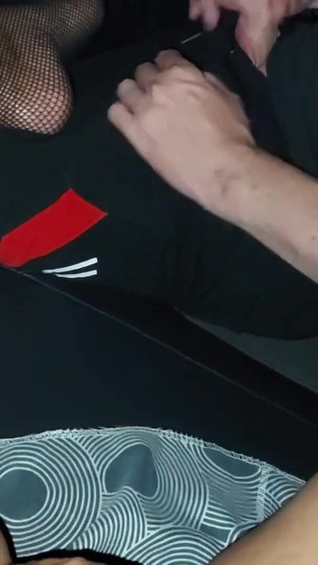 Stunning moment from "Horny wife in nylons gives handjob and footjob to stranger in car in public"