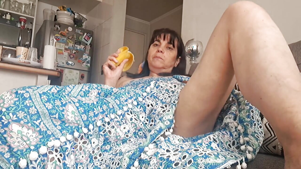 Stepmom in Armchair Touching Her Pussy