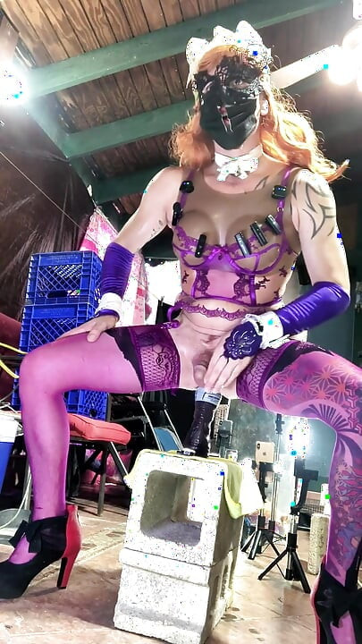 Sexy Shemale in Violet Lingerie Inserting Bottle in His Ass