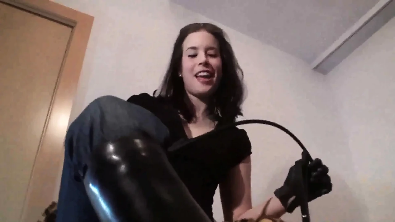 Close up of whore slave licking his mistress boots