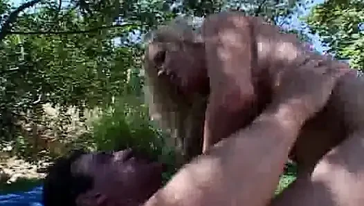 Busty blonde doll gets a facial after intense anal outdoor fuck