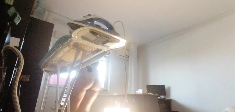 Sexy wife doing housework naked. Brunette, hairy pussy, big ass, big tits. Sexy mom massages herself with a vibrator.