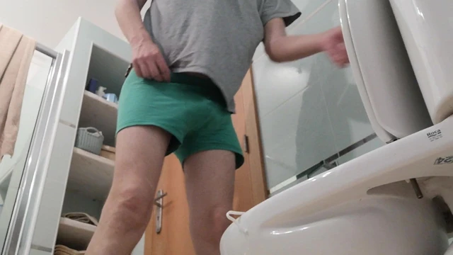 Daddy caught pissing