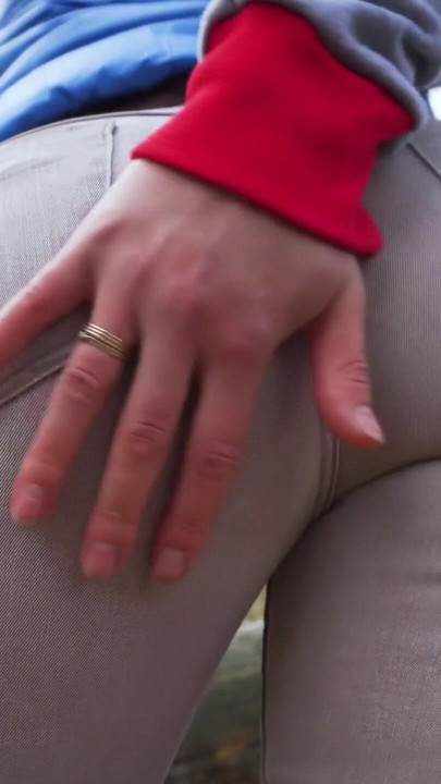 Stunning moment from "Real Amateur In Tight Pants Showing Off Her Visible Panty Line Ass Outdoor"