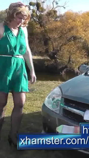Spectacular moment from "Milf beautiful sexy blonde outdoors on river bank washes car without panties and bra under dress."