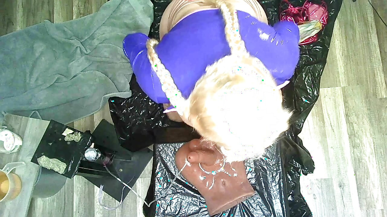 Blonde pony-tailed shemale sucks off dildo for milky surprise.