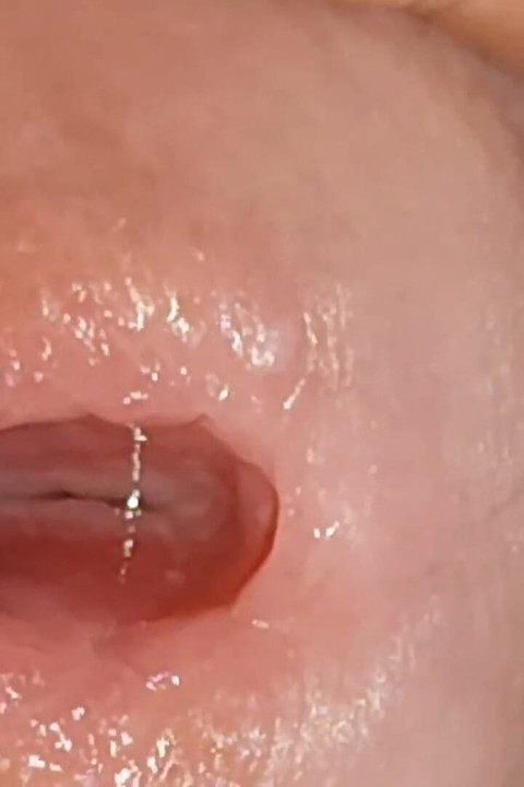Wide Hole Filled with Pre Cum in Close up