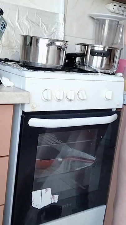 Sexy Latina nude in the kitchen. Sexy naked wife prepares food in the kitchen. | Clip 1