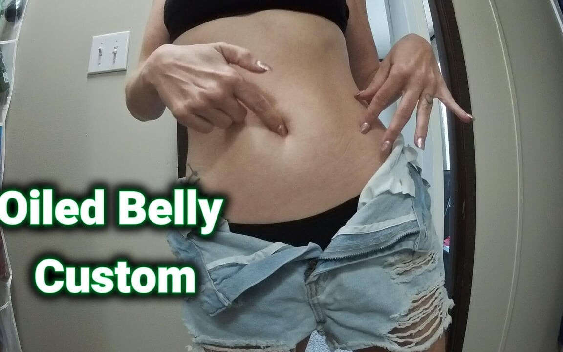 Massagem oleada na barriga e jogo do umbigo