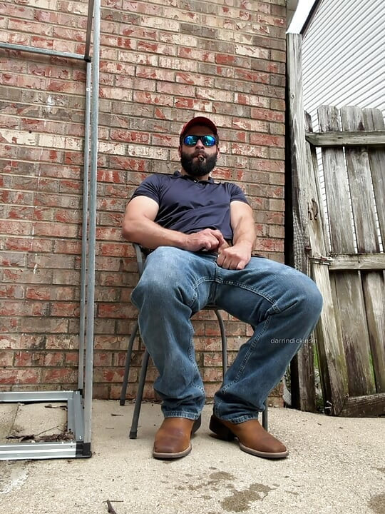 Booted Bearded Fella Cigar and Edge Out Back