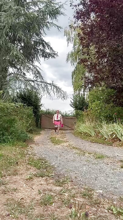 Dressed in a pink plaid mini skirt for a night out