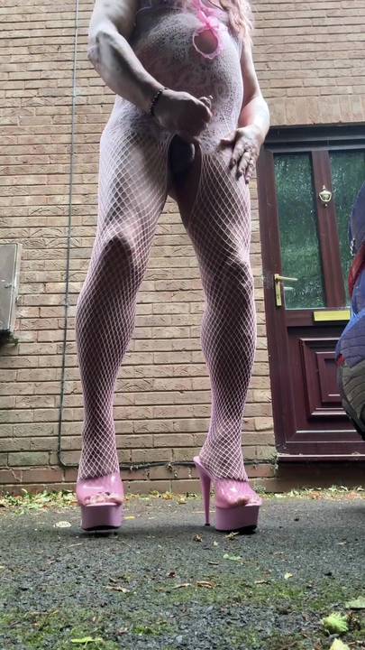 Memorable moment from "Sexy Crossdresser Kellycd2022 quick early morning video in pink fishnet bodysuit and heels"