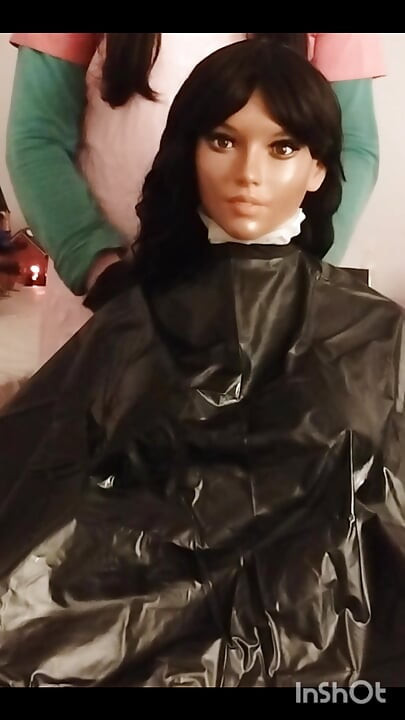 Ebony Sex doll Nikki shows off vinyl shampoo capes