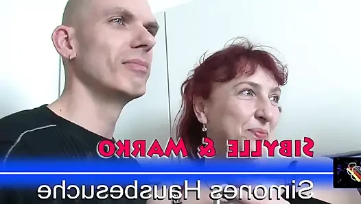 Ateşli Alman olgun mutfakta üçlü sikiş