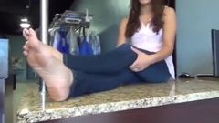 Showing Her Feet at Work