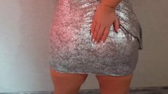 Girl in silver dress touching big ass