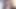 Darkhair busty trans masturbates on bed after stripping