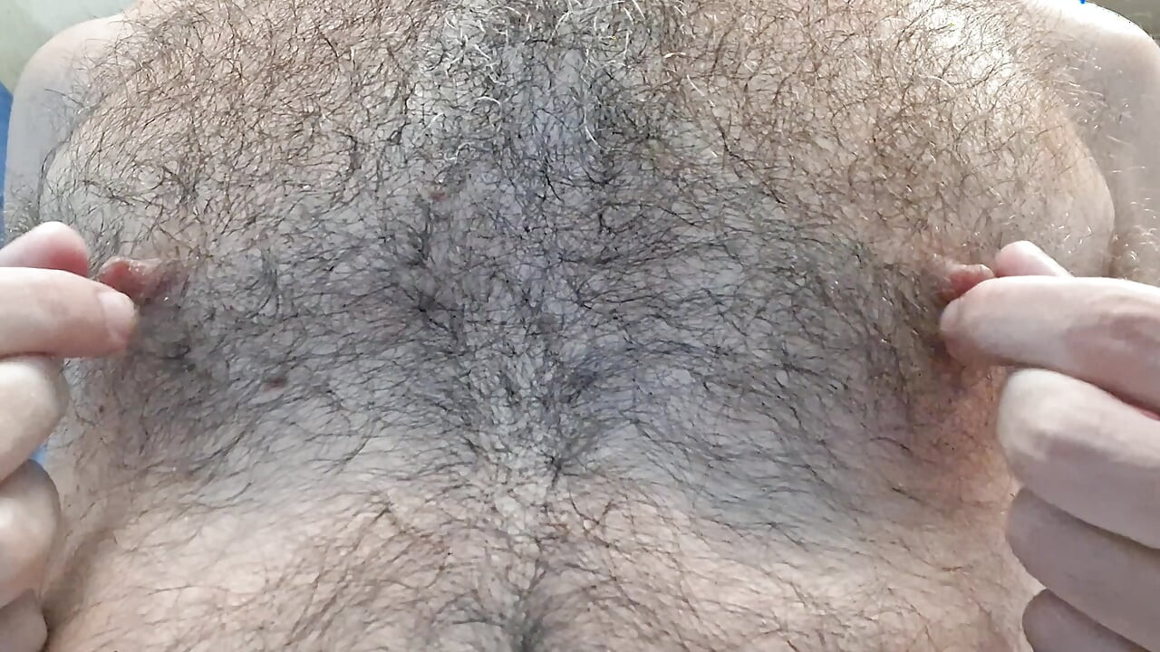 Torturing hairy nipples