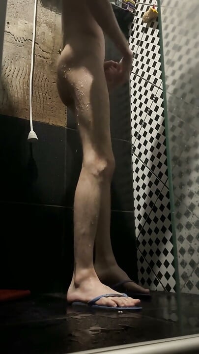Skinny Twink Playing with a Toy at the Shower