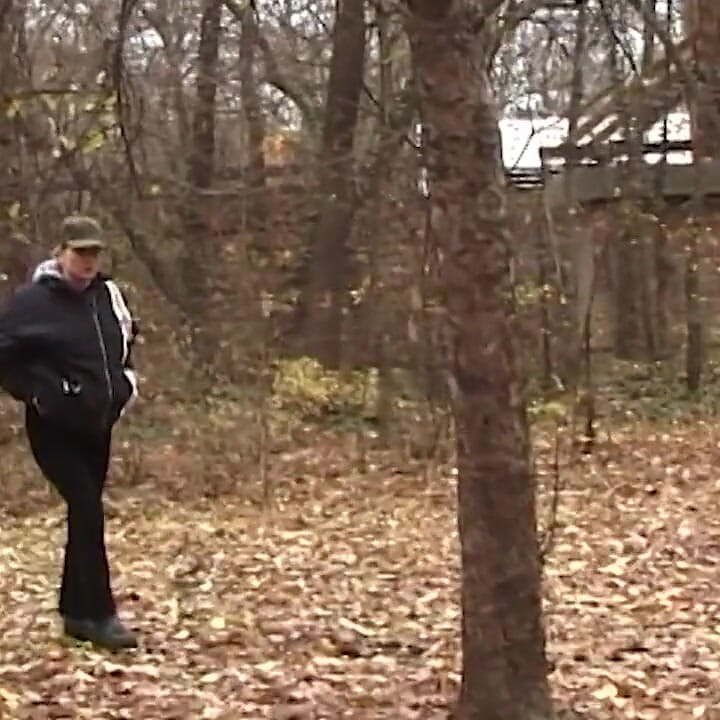 Young chick peeing in the park