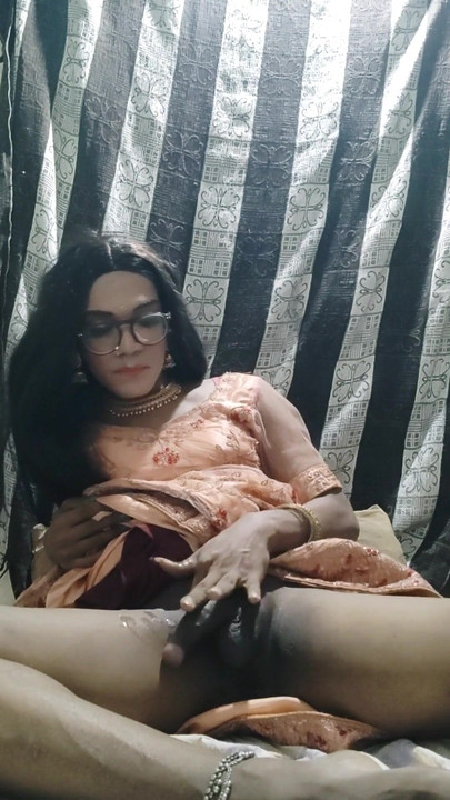 Stunning moment from "Desi Indian shemale Cumming in traditional lehanga and eating her own cum"