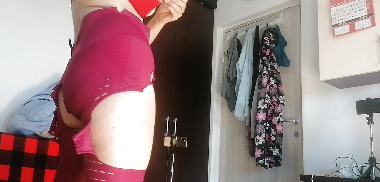 Sexy Latina Having Fun Trying on Clothes and Cutting Them