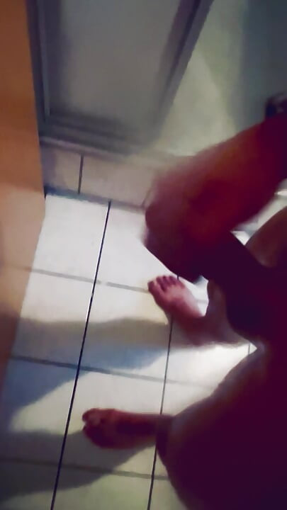 German man is horny in the shower.