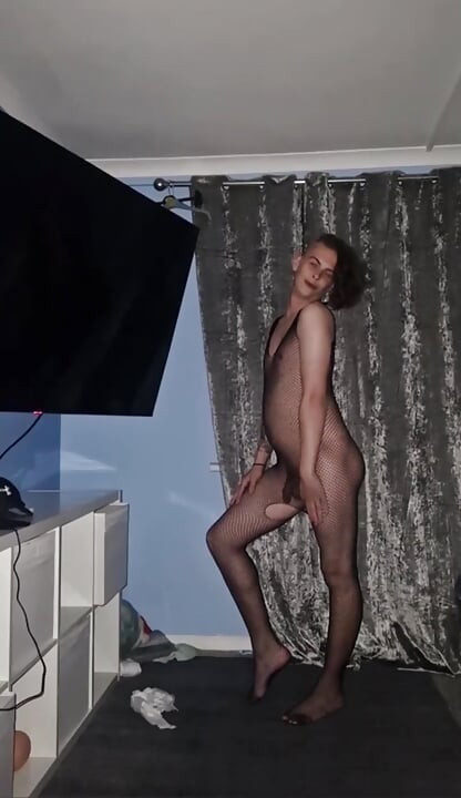 Posing nude wearing my fishnet outfit (photoshoot)