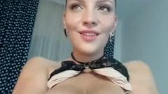 Busty Brunette Shows Her Assests On Cam