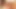 An attractive brunette with dark complexion who wears fishnets and derives pleasure from having her genitals sex and being spray