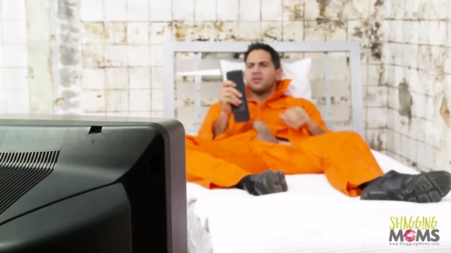 Horny prisoner gets his cock pleased by a busty slut