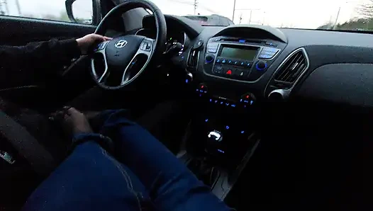 Amateur MILF in jeans and nylon socks gives a taxi driver a footjob