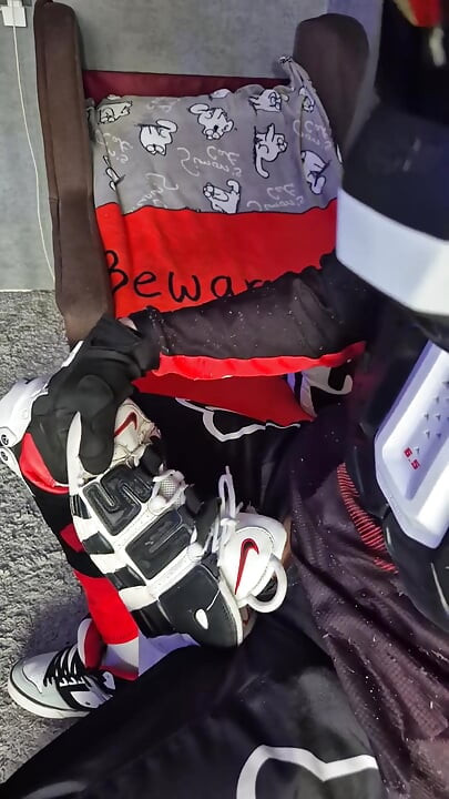 An Excited Guy in Motorcycle Gear Fucks His Sneakers