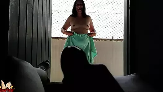 My wife exhibits her tits on the balcony
