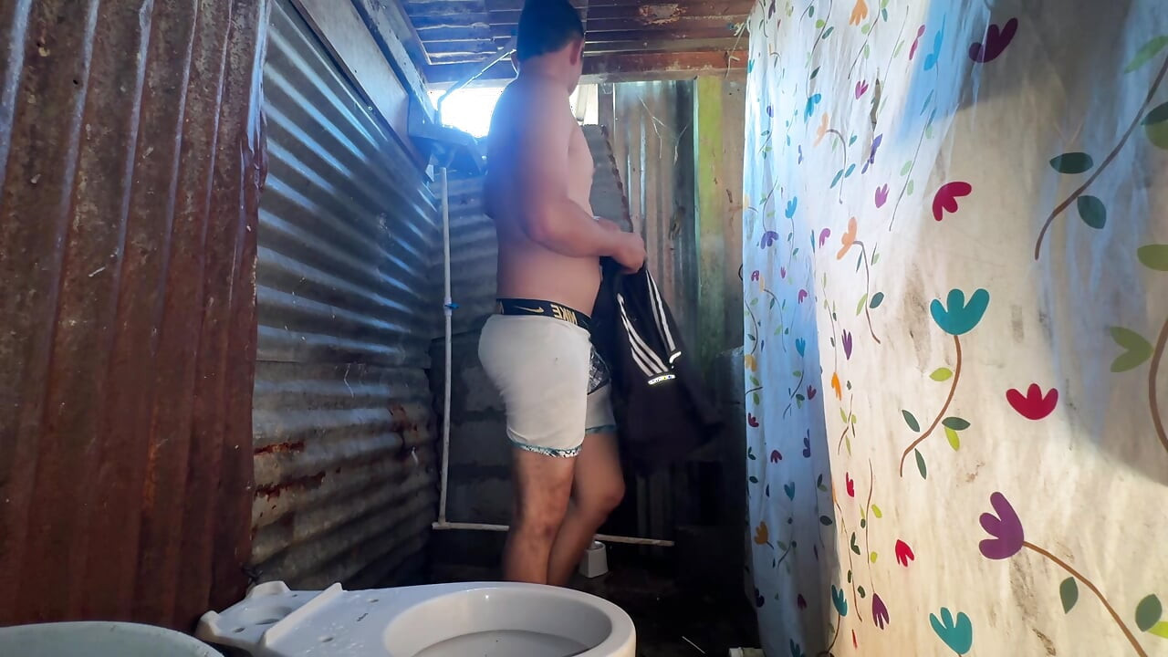 Big cock man showering and showing his big cock