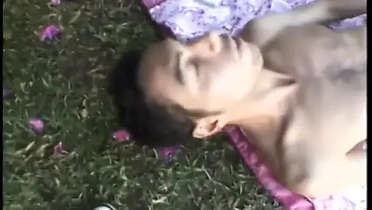Bisexual threesome with stunning brunette and two hot studs fucking outdoors