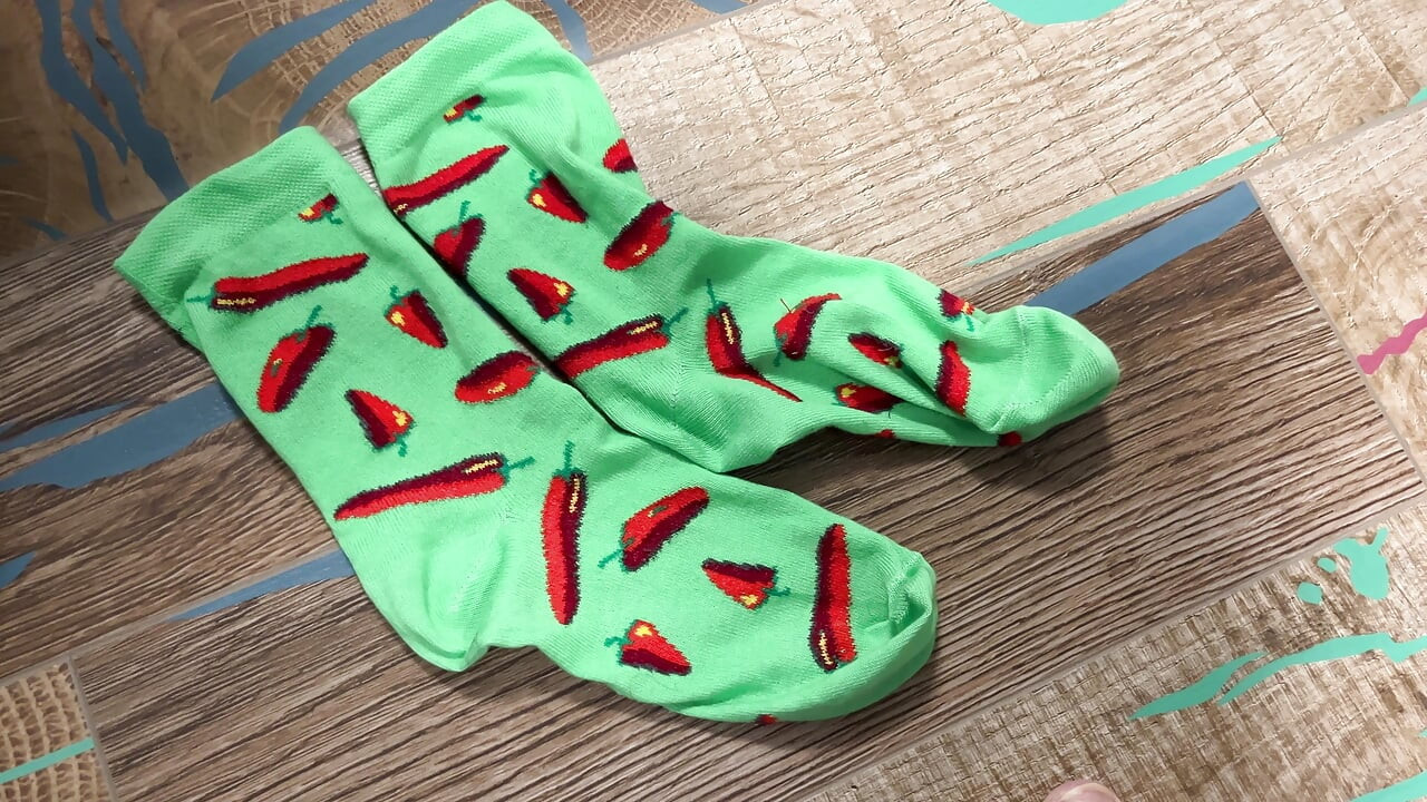 Playful Green Socks with Red Pepper Pattern pres. by Earl Smile