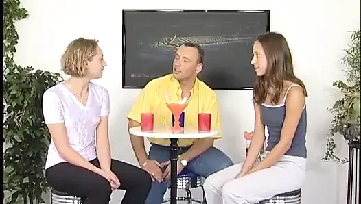 Two lovely teens are pleasuring guy's rod at the casting