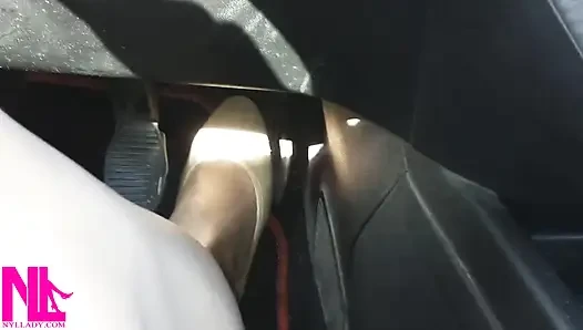 Driving Fast in Beige Pumps on Way to Airport