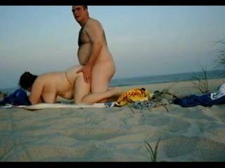 Chubby Couple have sex on the beach