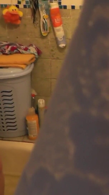 Must-see moment from "Stepmom goes to bathroom, wanks pussy, student stepson watches"