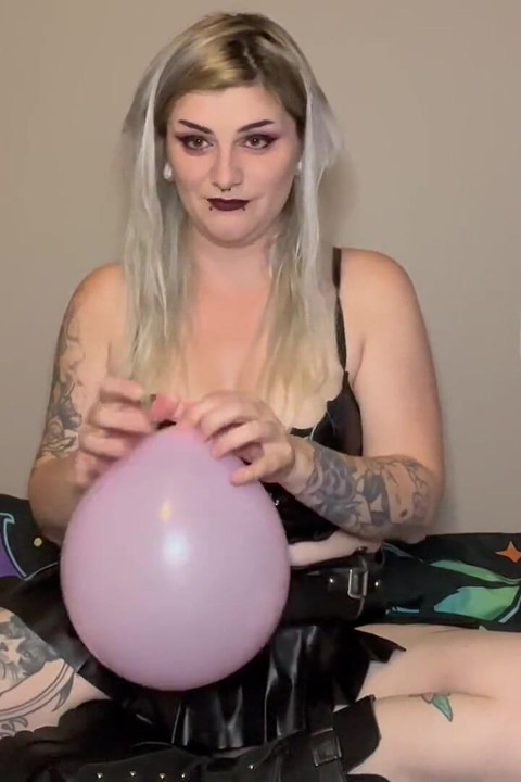 Goth Girl Inflating Her Birthday Balloons