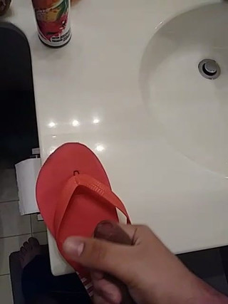 Friend having fun with his step moms Maria flip flops at home