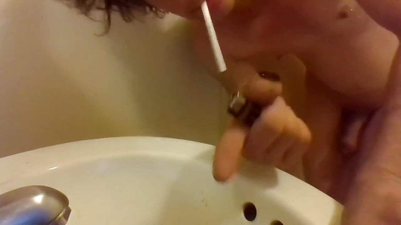 Peeing Draped Over a Sink