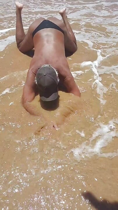 Ladysilva on the beach showing off her hot ass in panties