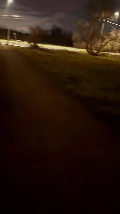 Strip naked and barefoot on a lane by a road , beat my hard meat as cars passed